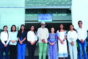 Keziah with Savjibhai team 1