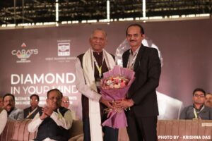 1. PRESIDENT OF SURAT DIAMOND ASSOCIATION HONORING CHAIRMAN OF SURAT DIAMOND BOURSE MR. GOVINDBHAI DHOLAKIYA