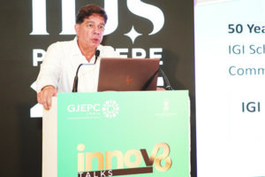 Mr. Tehmasp Printer MD CEO IGI at a Seminar speaking about their properietory Light Performance Analysis